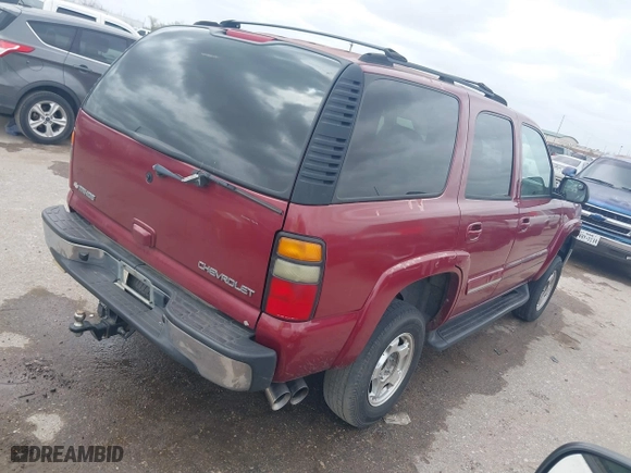 2004 Chevrolet Tahoe LT with VIN 1GNEC13Z34J203100, listed as a IAAI auction lot 41749196 with 188,416 mi miles. Bid and sale history available at carsss.com. Image 4.