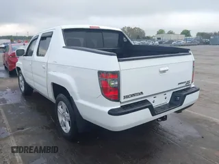 2014 Honda Ridgeline RTL with VIN 5FPYK1F58EB011186, listed as a IAAI auction lot 41903178 with 113,364 mi miles. Bid and sale history available at carsss.com. Image 3.