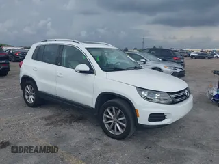 2017 Volkswagen Tiguan Wolfsburg Edition with VIN WVGRV7AX6HK008208, listed as a IAAI auction lot 41968797 with 85,764 mi miles and . Bid and sale history available at DreamBid. Image 1.