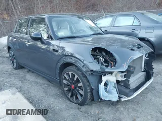 2016 MINI Cooper Hardtop 4 Door S with VIN WMWXU3C56G2B63682, listed as a IAAI auction lot 41244676 with 110,902 mi miles. Bid and sale history available at carsss.com. Image 1.