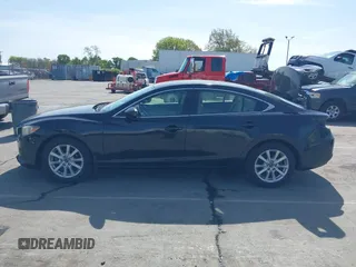 2016 Mazda Mazda6 i Sport with VIN JM1GJ1U54G1422560, listed as a IAAI auction lot 41935881 with 87,030 mi miles. Bid and sale history available at carsss.com. Image 15.