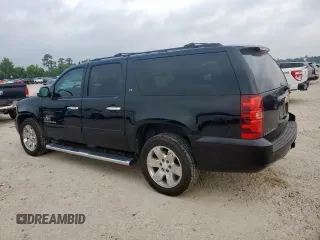 2012 Chevrolet Suburban LT with VIN 1GNSCJE01CR325049, listed as a Copart auction lot 56212525 with 264,000 mi miles and Clean title. Bid and sale history available at DreamBid. Image 2.