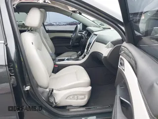 2014 Cadillac SRX Luxury Collection with VIN 3GYFNBE32ES631269, listed as a IAAI auction lot 41908855 with 55,154 mi miles and . Bid and sale history available at carsss.com. Image 5.