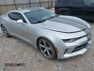 2017 Chevrolet Camaro 1LT z VIN 1G1FB1RX0H0183382, wystawiony jako IAAI lot #42183377 z przebiegiem 80 887 mil mil oraz . Historia ofert i sprzedaży dostępna na DreamBid. Obrazek 1.