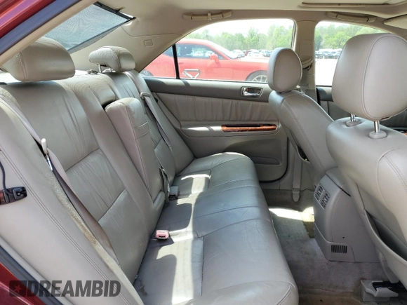 2003 Toyota Camry LE z VIN JTDBF30K530091667, wystawiony jako Copart lot #54576175 z przebiegiem 230 772 mil mil oraz Czysty tytuł • Clean title. Historia ofert i sprzedaży dostępna na DreamBid. Obrazek 10.
