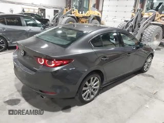 2020 Mazda 3 Premium with VIN 3MZBPBEM3LM123091, listed as a IAAI auction lot 41568213 with 68,515 mi miles and . Bid and sale history available at DreamBid. Image 4.