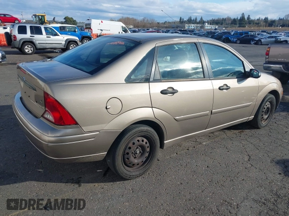 2004 Ford Focus SE with VIN 1FAFP34354W167961, listed as a IAAI auction lot 41545304 with 128,560 mi miles and . Bid and sale history available at DreamBid. Image 4.