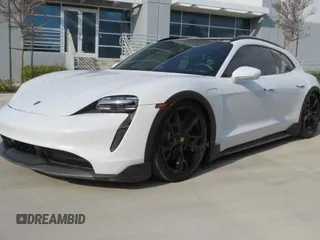 2022 Porsche Taycan 4 z VIN WP0BA2Y19NSA67581, wystawiony jako Copart lot #59634035 z przebiegiem 6 775 mil mil oraz Szkoda całkowita • Salvage title. Historia ofert i sprzedaży dostępna na DreamBid. Obrazek 2.