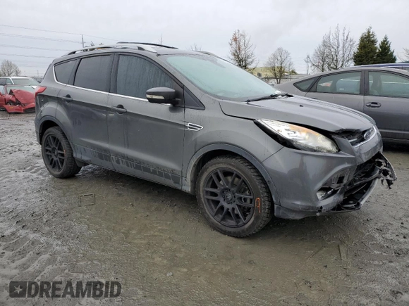 2015 Ford Escape Titanium with VIN 1FMCU9J92FUA62323, listed as a Copart auction lot 85826724 with 108,315 mi miles and Salvage Title. Bid and sale history available at DreamBid. Image 4.