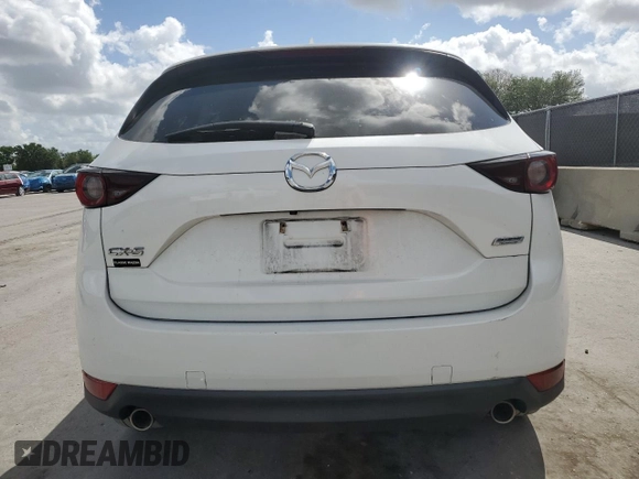 2019 Mazda CX-5 Touring with VIN JM3KFACM5K0693931, listed as a Copart auction lot 51599685 with 51,907 mi miles and Non Repairable. Bid and sale history available at carsss.com. Image 6.