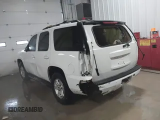 2007 GMC Yukon SLT with VIN 1GKFK130X7R203221, listed as a IAAI auction lot 41583409 with 254,586 mi miles. Bid and sale history available at carsss.com. Image 3.