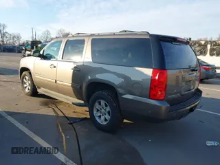 2014 GMC Yukon XL SLT with VIN 1GKS1KE06ER127515, listed as a IAAI auction lot 40990479 with 236,725 mi miles. Bid and sale history available at carsss.com. Image 3.