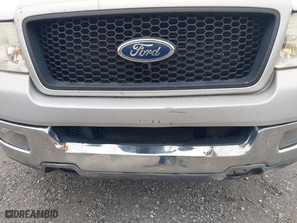2004 Ford F-150 XL with VIN 1FTPX12544NC61388, listed as a IAAI auction lot 41845397 with 302,883 mi miles. Bid and sale history available at carsss.com. Image 14.