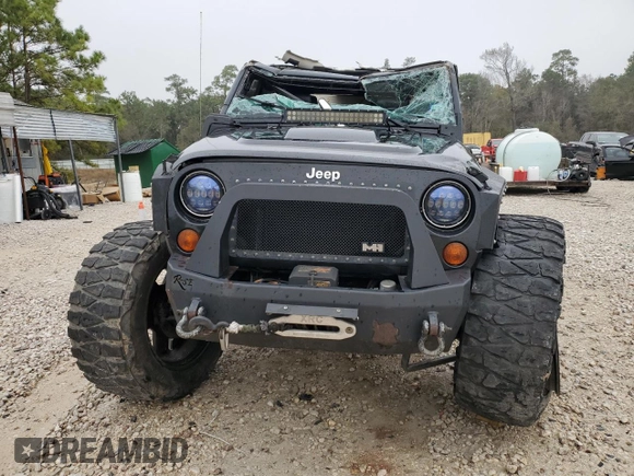 2012 Jeep Wrangler Unlimited Rubicon with VIN 1C4HJWFG7CL205244, listed as a Copart auction lot 86651914 with Not provided miles and Salvage title. Bid and sale history available at DreamBid. Image 5.