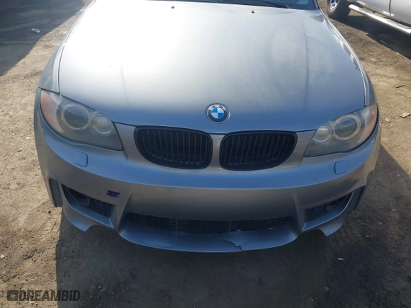 2009 BMW 1 Series 135i with VIN WBAUC73549VK80091, listed as a IAAI auction lot 41228611 with 128,515 mi miles. Bid and sale history available at carsss.com. Image 6.