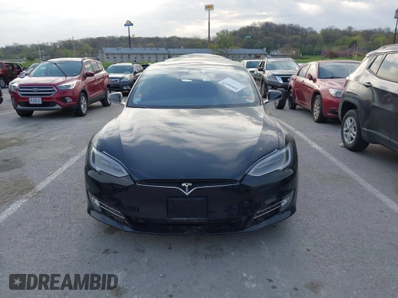 2017 Tesla Model S 100D with VIN 5YJSA1E28HF188981, listed as a IAAI auction lot 42010115 with 76,327 mi miles and . Bid and sale history available at DreamBid. Image 12.