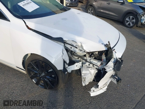 2022 Mazda 3 2.5 Turbo with VIN 3MZBPBAY2NM311824, listed as a IAAI auction lot 41038030 with 21,669 mi miles and . Bid and sale history available at DreamBid. Image 6.