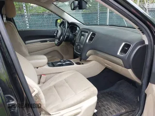 2014 Dodge Durango SXT z VIN 1C4RDJAG0EC972801, wystawiony jako IAAI lot #42754686 z przebiegiem 210 458 mil mil oraz . Historia ofert i sprzedaży dostępna na DreamBid. Obrazek 5.