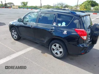 2008 Toyota RAV4 with VIN JTMBD33V986063323, listed as a IAAI auction lot 42025044 with 163,785 mi miles. Bid and sale history available at carsss.com. Image 3.