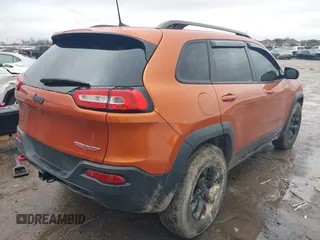 2016 Jeep Cherokee Trailhawk z VIN 1C4PJMBS0GW155379, wystawiony jako IAAI lot #41472352 z przebiegiem 116 036 mil mil oraz . Historia ofert i sprzedaży dostępna na DreamBid. Obrazek 4.