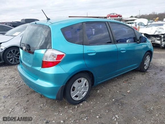 2013 Honda Fit with VIN JHMGE8H36DC023041, listed as a IAAI auction lot 41144523 with 121,307 mi miles. Bid and sale history available at carsss.com. Image 4.