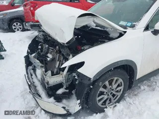 2016 Mazda CX-9 Touring with VIN JM3TCBCY4G0122329, listed as a IAAI auction lot 41453150 with 104,665 mi miles. Bid and sale history available at carsss.com. Image 6.