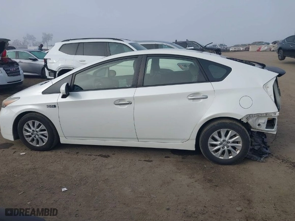 2014 Toyota Prius Plug-In with VIN JTDKN3DP5E3056511, listed as a IAAI auction lot 41230272 with 123,013 mi miles. Bid and sale history available at carsss.com. Image 15.