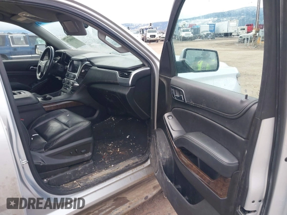 2019 Chevrolet Tahoe LT with VIN 1GNSKBKC7KR175468, listed as a IAAI auction lot 41680274 with 159,155 mi miles and . Bid and sale history available at DreamBid. Image 5.