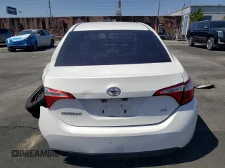 2016 Toyota Corolla L z VIN 5YFBURHE5GP516744, wystawiony jako Copart lot #56252835 z przebiegiem 122 338 mil mil oraz Szkoda całkowita • Salvage title. Historia ofert i sprzedaży dostępna na DreamBid. Obrazek 6.