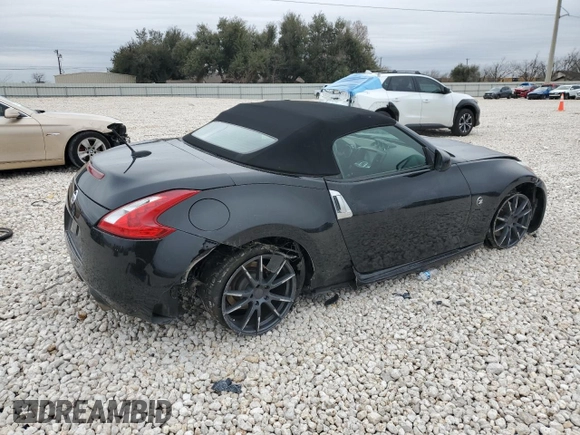 2014 Nissan 370Z Touring with VIN JN1AZ4FH1EM620177, listed as a Copart auction lot 42581255 with 106,957 mi miles and Salvage Title. Bid and sale history available at DreamBid. Image 3.