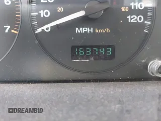 2003 Jeep Grand Cherokee Laredo with VIN 1J4GX48S43C518584, listed as a IAAI auction lot 42213094 with 163,743 mi miles and . Bid and sale history available at DreamBid. Image 16.