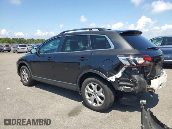2015 Mazda CX-9 Touring with VIN JM3TB3CV8F0464265, listed as a Copart auction lot 64359885 with 95,980 mi miles and Salvage title. Bid and sale history available at DreamBid. Image 2.