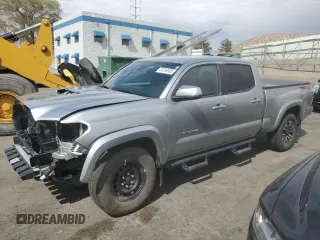 2022 Toyota Tacoma SR5 with VIN 3TMDZ5BN0NM129843, listed as a Copart auction lot 54789595 with 88,519 mi miles and Salvage title. Bid and sale history available at DreamBid. Image 1.