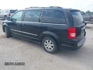 2010 Chrysler Town & Country Touring with VIN 2A4RR5D13AR155611, listed as a IAAI auction lot 42094894 with 132,966 mi miles. Bid and sale history available at carsss.com. Image 3.