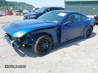 2024 Ford Mustang GT z VIN 1FA6P8CF8R5419756, wystawiony jako IAAI lot #42482363 z przebiegiem 20 480 mil mil oraz . Historia ofert i sprzedaży dostępna na DreamBid. Obrazek 18.