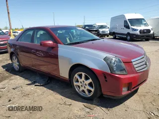2003 Cadillac CTS z VIN 1G6DM57N830151907, wystawiony jako Copart lot #56451425 z przebiegiem 116 349 mil mil oraz Tytuł czysty. Historia ofert i sprzedaży dostępna na DreamBid. Obrazek 4.
