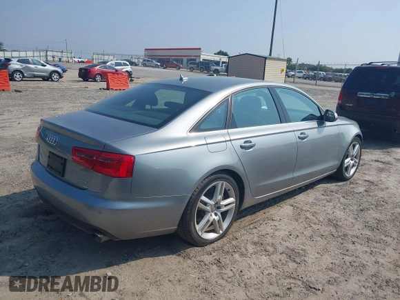 2015 Audi A6 Premium Plus with VIN WAUGFAFC7FN005497, listed as a IAAI auction lot 42402477 with 79,334 mi miles and . Bid and sale history available at DreamBid. Image 4.
