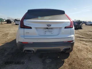 2019 Cadillac XT4 AWD Premium Luxury with VIN 1GYFZDR42KF182713, listed as a Copart auction lot 48633265 with 60,836 mi miles and Salvage title. Bid and sale history available at DreamBid. Image 6.