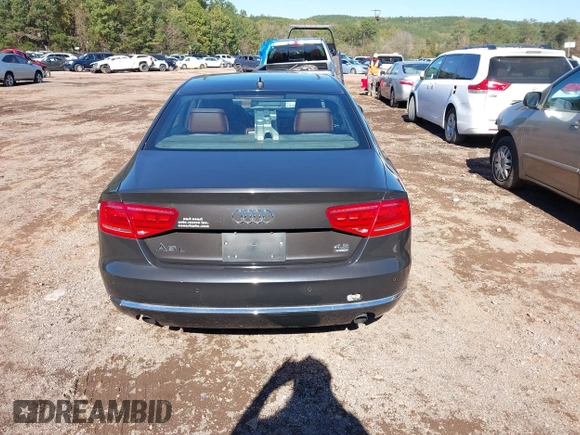 2011 Audi A8 with VIN WAURVAFDXBN014290, listed as a IAAI auction lot 40860777 with 152,584 mi miles and . Bid and sale history available at DreamBid. Image 16.