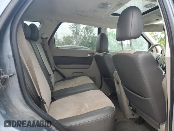 2010 Mercury Mariner Premier with VIN 4M2CN8HG3AKJ16128, listed as a Copart auction lot 58649895 with 157,798 mi miles and Salvage title. Bid and sale history available at DreamBid. Image 11.