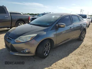 2013 Ford Focus SE z VIN 1FADP3F2XDL283847, wystawiony jako Copart lot #52906595 z przebiegiem 103 986 mil mil oraz Czysty tytuł • Clean title. Historia ofert i sprzedaży dostępna na DreamBid. Obrazek 1.