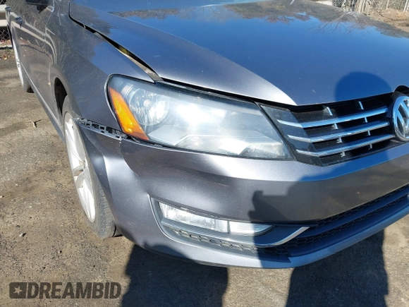 2014 Volkswagen Passat TDI SEL Premium with VIN 1VWCN7A30EC065191, listed as a IAAI auction lot 41860810 with 275,430 mi miles. Bid and sale history available at carsss.com. Image 6.