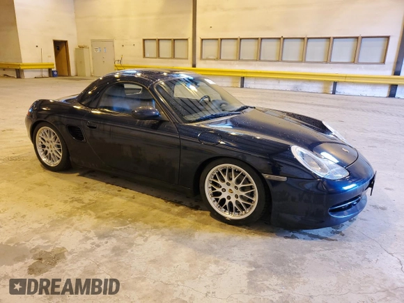 1999 Porsche Boxster z VIN WP0CA2983XU630435, wystawiony jako Copart lot #47402785 z przebiegiem 62 180 mil mil oraz Szkoda całkowita • Salvage title. Historia ofert i sprzedaży dostępna na DreamBid. Obrazek 4.
