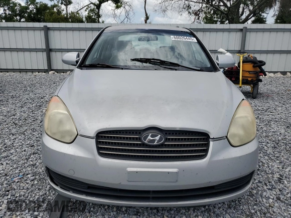 2009 Hyundai Accent Auto GLS z VIN KMHCN46C19U373167, wystawiony jako Copart lot #60026445 z przebiegiem 94 736 mil mil oraz Szkoda całkowita • Salvage title. Historia ofert i sprzedaży dostępna na DreamBid. Obrazek 5.