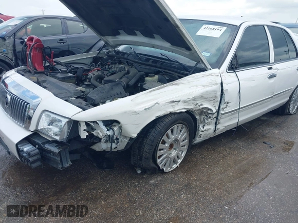 2006 Mercury Grand Marquis LS Premium z VIN 2MEFM75V56X618077, wystawiony jako IAAI lot #42168194 z przebiegiem 81 756 mil mil oraz . Historia ofert i sprzedaży dostępna na DreamBid. Obrazek 6.