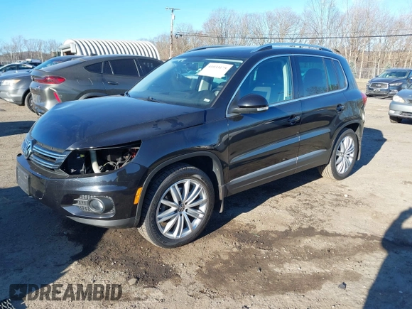 2014 Volkswagen Tiguan S z VIN WVGBV3AX4EW581302, wystawiony jako IAAI lot #41033175 z przebiegiem 69 791 mil mil oraz . Historia ofert i sprzedaży dostępna na DreamBid. Obrazek 17.
