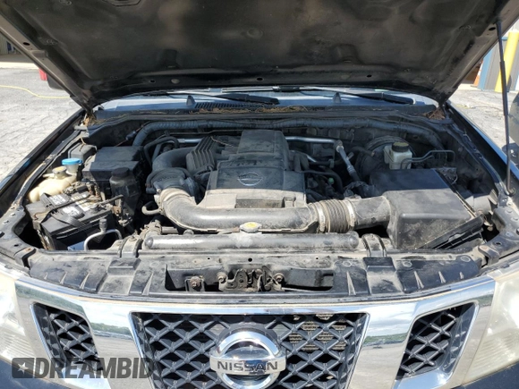 2010 Nissan Frontier Pro-4X z VIN 1N6AD0EV4AC423903, wystawiony jako Copart lot #56483965 z przebiegiem 170 442 mil mil oraz Szkoda całkowita • Salvage title. Historia ofert i sprzedaży dostępna na DreamBid. Obrazek 11.