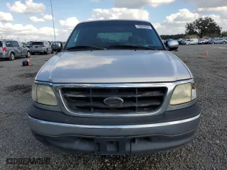 2001 Ford F-150 Work Series with VIN 2FTRX17W21CA26757, listed as a Copart auction lot 79602654 with 0 mi miles and Non Repairable. Bid and sale history available at carsss.com. Image 5.