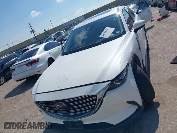 2019 Mazda CX-9 Touring with VIN JM3TCACY7K0314539, listed as a IAAI auction lot 42234361 with 98,299 mi miles and . Bid and sale history available at DreamBid. Image 12.