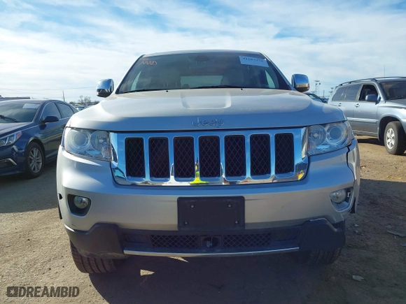 2012 Jeep Grand Cherokee Overland with VIN 1C4RJFCTXCC201422, listed as a IAAI auction lot 41283376 with 93,736 mi miles. Bid and sale history available at carsss.com. Image 12.